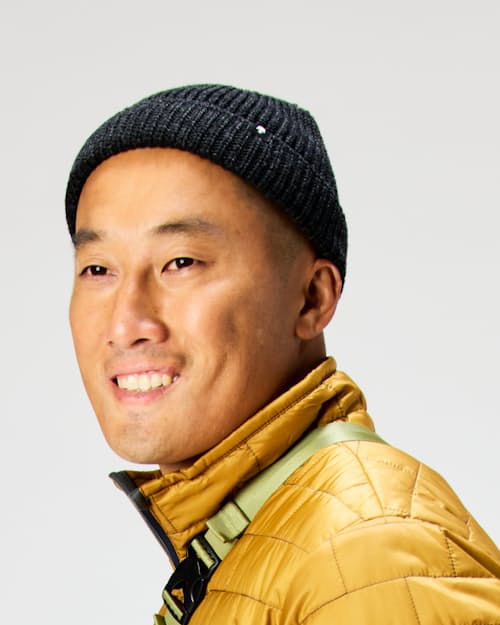 on model image of Short Roll Beanie