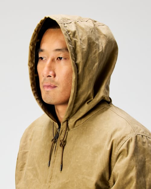 on model image of Flannel-Lined Hooded Waxed Jacket