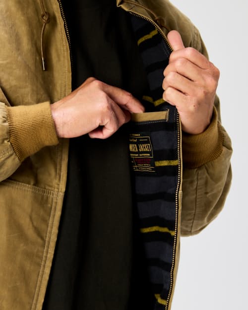 on model image of Flannel-Lined Hooded Waxed Jacket