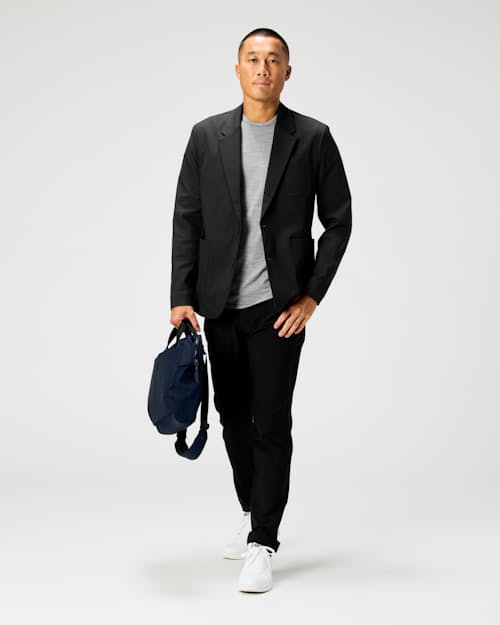 on model image of Nomad Performance Chino - HB Straight