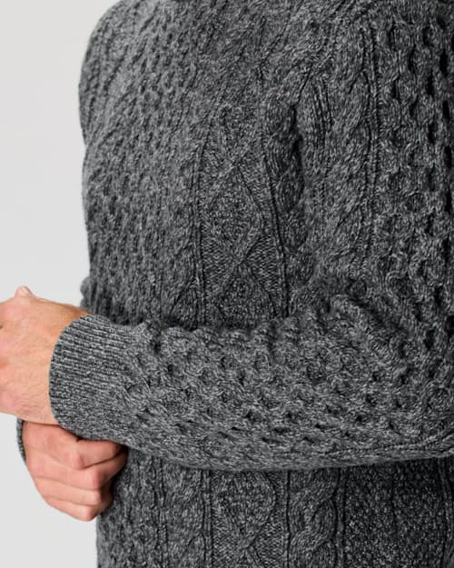 on model image of Aran Cable Knit Crewneck Sweater