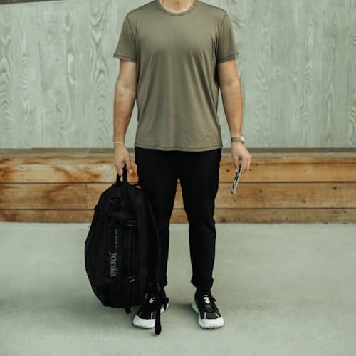 lifestyle image of Black Hole MLC Travel Backpack - 45L