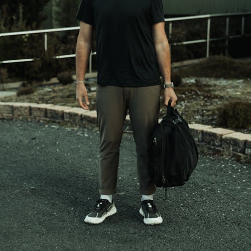 lifestyle image of Black Hole MLC Travel Backpack - 45L