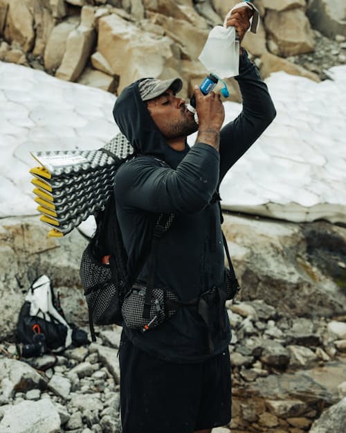 lifestyle image of 72-Hour Merino UPF Hoodie