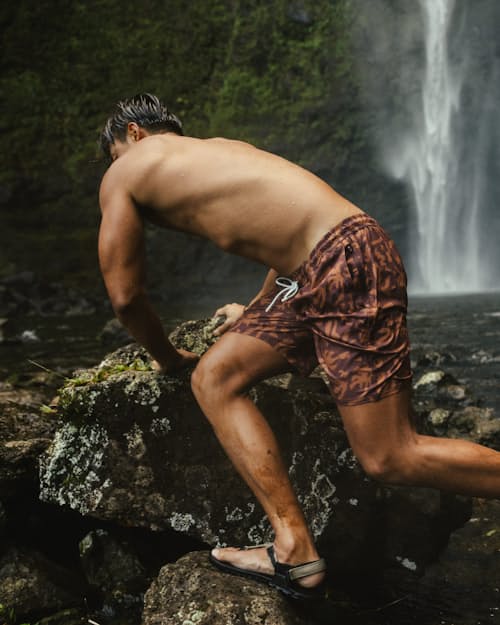 lifestyle image of Performance Lined Swim Trunks - 7"