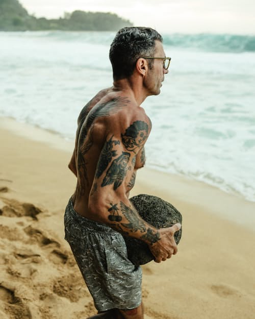 lifestyle image of Performance Lined Swim Trunks - 7"