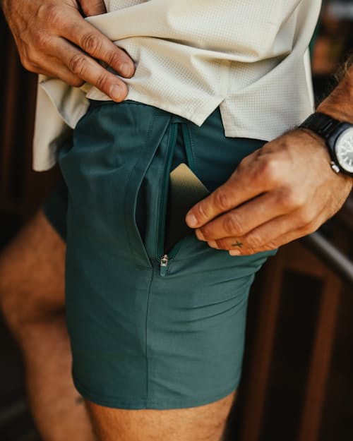 lifestyle image of Performance Lined Swim Trunks - 5"