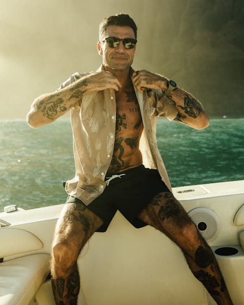 lifestyle image of Performance Lined Swim Trunks - 5"