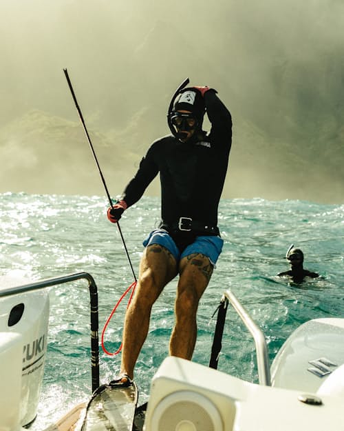 lifestyle image of Performance Lined Swim Trunks - 5"