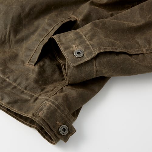 laydown detail image of Flannel-Lined Waxed Trucker Jacket