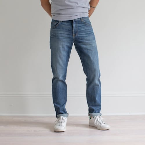 on model image of Graham Relaxed Tapered Denim Jeans