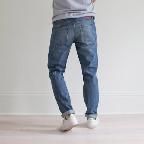 on model image of Graham Relaxed Tapered Denim Jeans