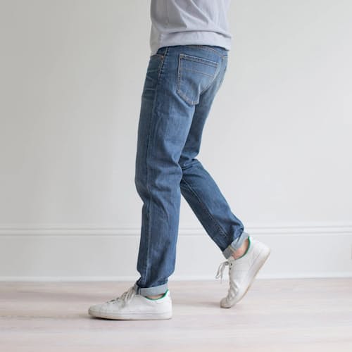 on model image of Graham Relaxed Tapered Denim Jeans
