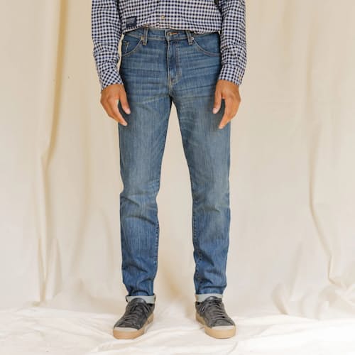 lifestyle image of Graham Relaxed Tapered Denim Jeans