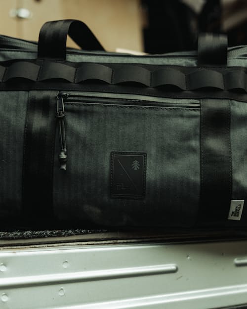 lifestyle image of Huckberry x Brown Buffalo Herringbone Twill Duffalo 50L