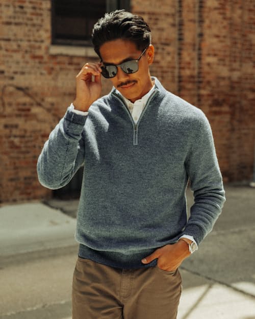 lifestyle image of Easycash Merino Quarter Zip Sweater