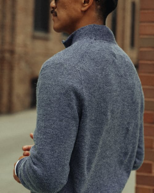lifestyle image of Easycash Merino Quarter Zip Sweater