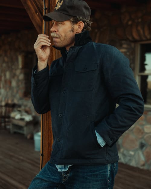 lifestyle image of Flannel-Lined Quilted Waxed Rancher Jacket