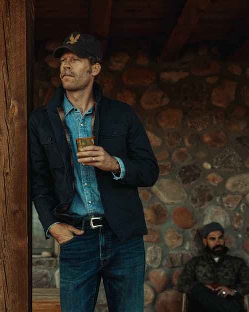 lifestyle image of Flannel-Lined Quilted Waxed Rancher Jacket