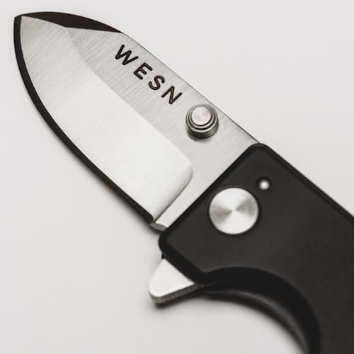 laydown image of Micro Blade Pocket Knife - Titanium