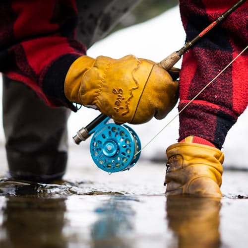 lifestyle image of Frontier Waxed Mittens