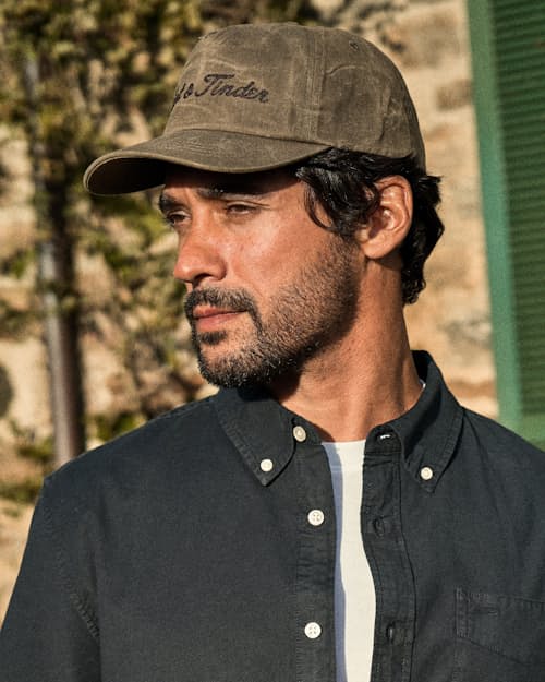 lifestyle image of Waxed Canvas Chain-Stitched Hat