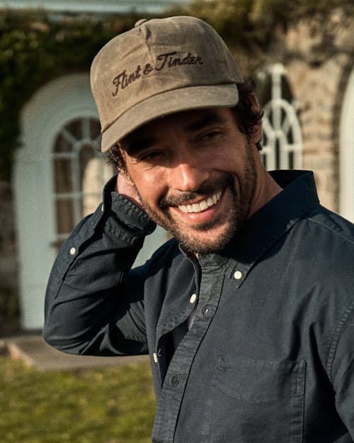 lifestyle image of Waxed Canvas Chain-Stitched Hat