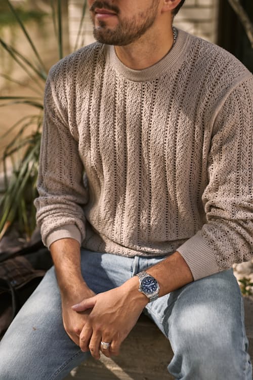 lifestyle image of Open Knit Stitch Crewneck Sweater