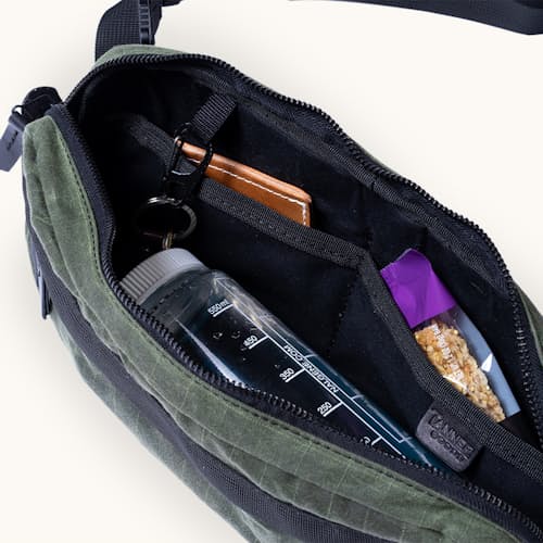 laydown image of Canyon Cross Body Pack