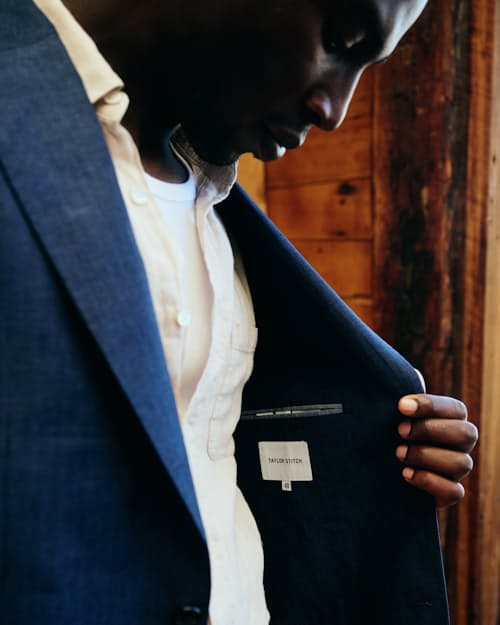 lifestyle image of The Stevens Linen Herringbone Blazer