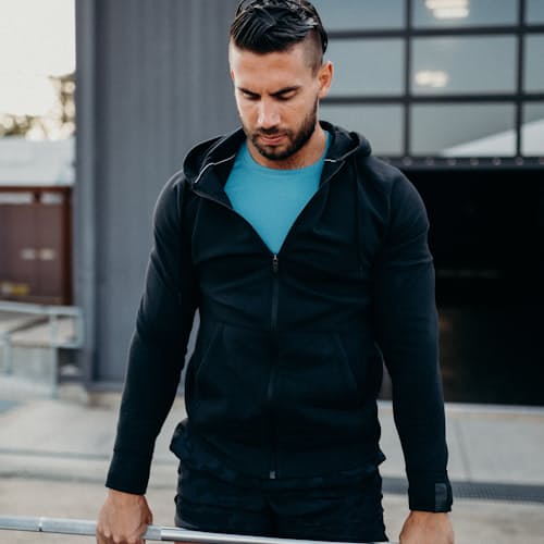 lifestyle image of Midweight Technical Popover Hoodie