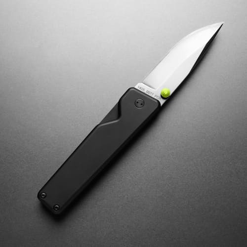 laydown image of The Chapter Knife - Serrated