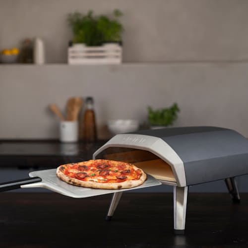 laydown image of Ooni Pizza Oven Bundle