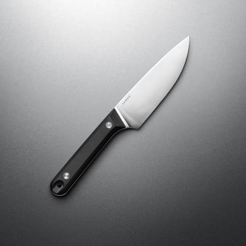 laydown image of The Hells Canyon Chef Knife