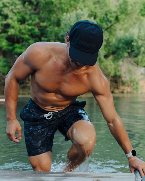 lifestyle image of TRLCapSC - Comp - Onehundred Hat