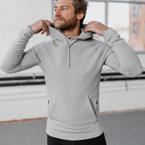 lifestyle image of Midweight Technical Popover Hoodie