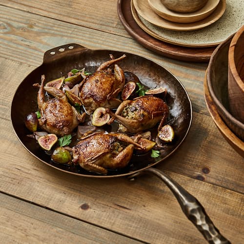 laydown image of Carbon Steel Farmhouse Skillet