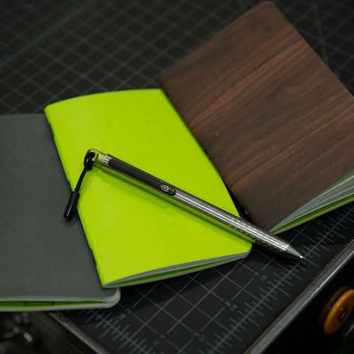 laydown image of TJB x Field Notes Ltd. Edition Grid Notepad - 3 Pack