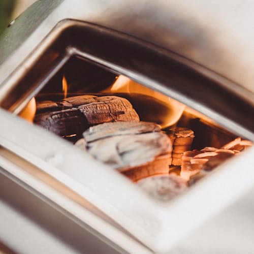laydown image of Ooni Karu 12 Wood and Charcoal-Fired Portable Pizza Oven