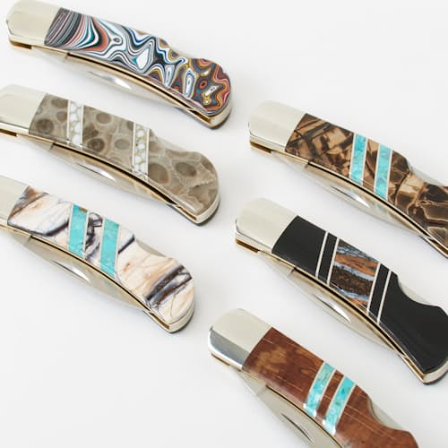 laydown image of G-10 + Natural Mammoth Tooth Pocket Knife