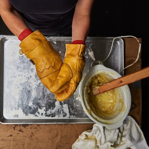 lifestyle image of Frontier Waxed Mittens