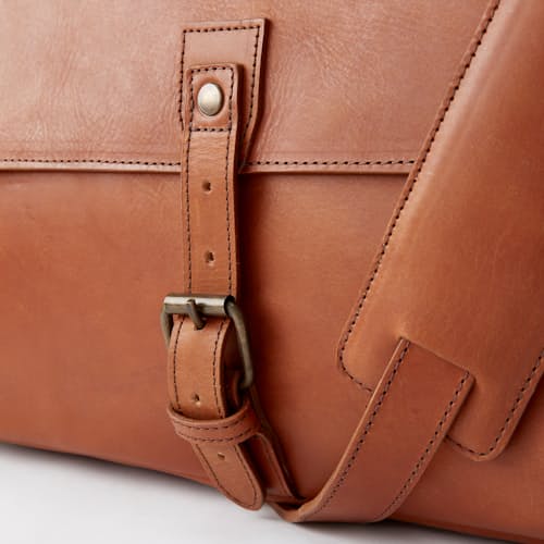 laydown image of Leather Messenger