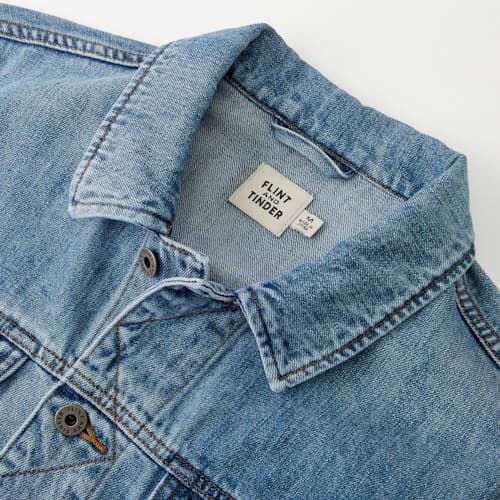 laydown image of Denim Trucker Jacket