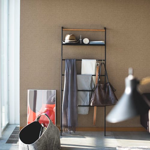 lifestyle image of Tower Leaning Ladder with Shelf
