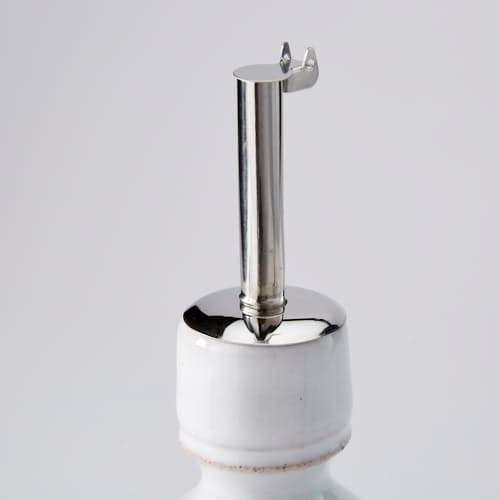 laydown image of Olive Oil Bottle