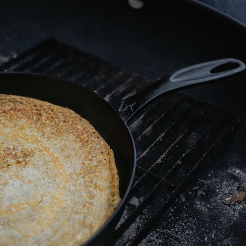 lifestyle image of Cast Iron Flat Pan