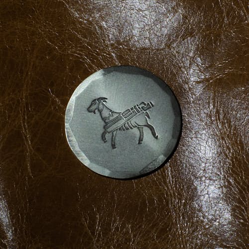 laydown image of Hand Forged Goat Ball Marker