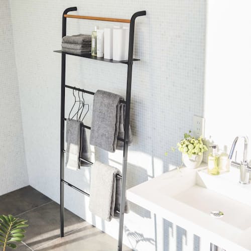 lifestyle image of Tower Leaning Ladder with Shelf