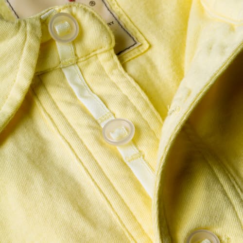 laydown image of Solid Slot Polo