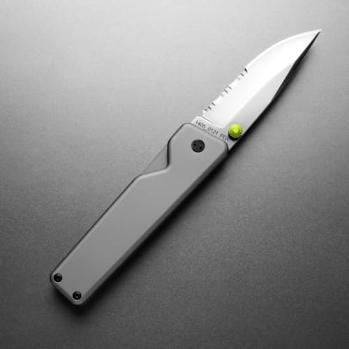 laydown image of The Chapter Knife - Serrated
